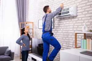 AC unit being installed